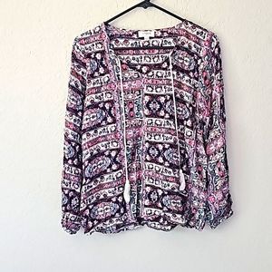 Umgee long-sleeved floral blouse with tassels